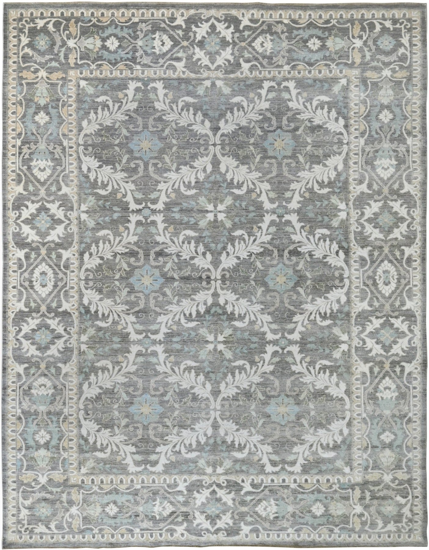 Knotted rug handknotted wool classic look. Quiet luxury in shades of gray, charcoal, blue, taupe, and ivory.