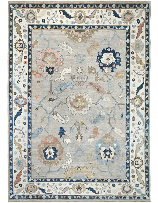 Luxury wool 9 x 12 oushak rug with navy, blue, gold, and gray.