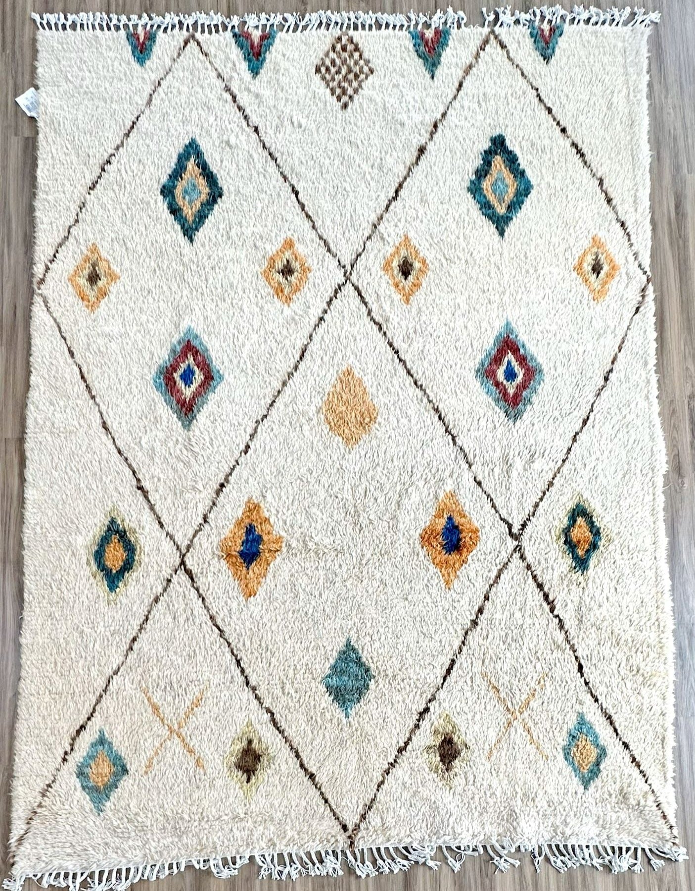 Best hand knotted Berber style moroccan rug. Tassel Fringe and thick pile.