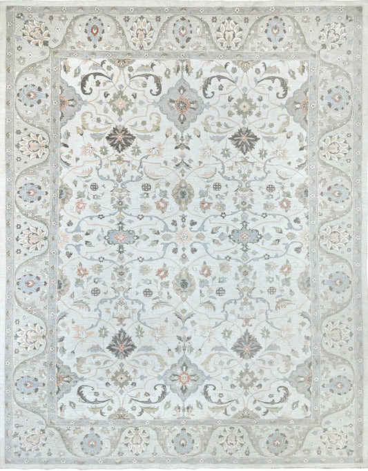 Luxury designer rug, neutral colors with a softly flowing pattern. Detailed border, size 10 x 14.