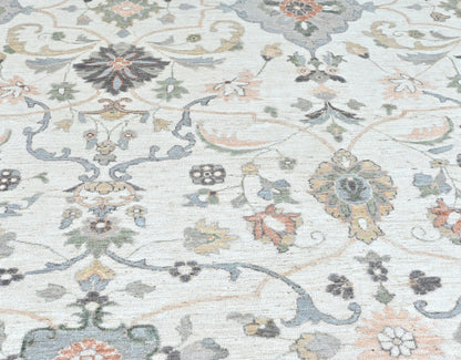 Luxury designer rug, neutral colors with a softly flowing pattern. Detailed border, size 10 x 14.