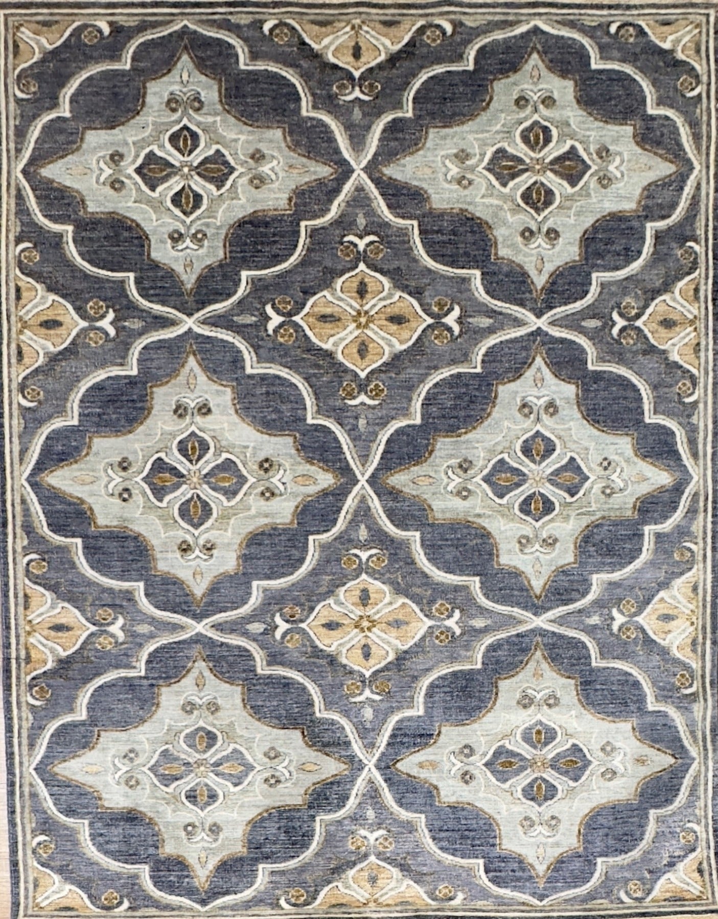New traditional gray hand-knotted rug with large scale, repetitive pattern with accents of seafoam, brass, and tobacco brown. Size 5 x 7