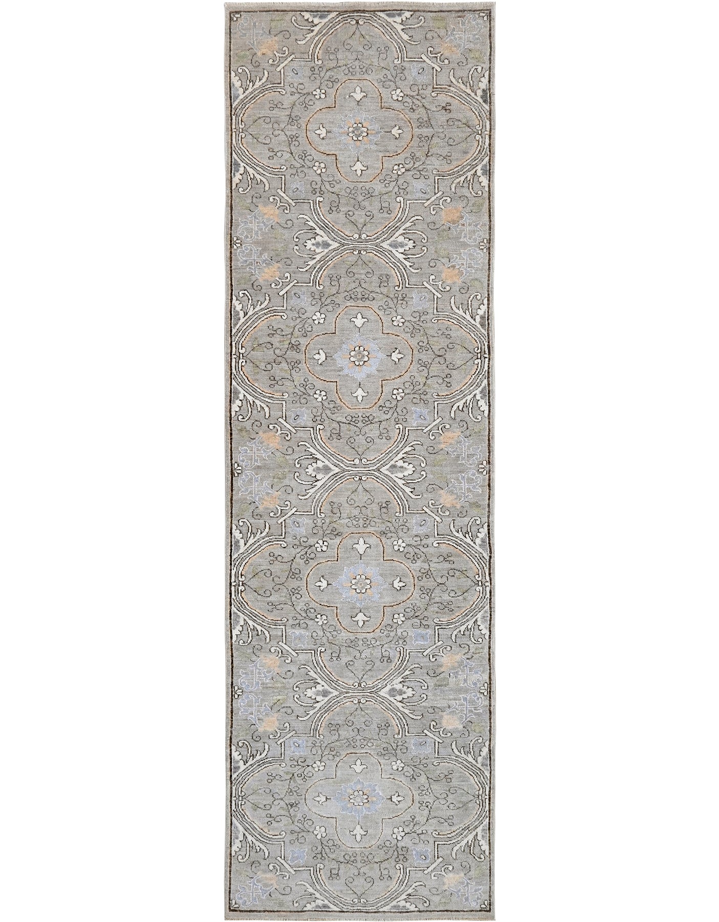 Hand-knotted wool ten foot long runner with a transitional pattern in gray, blue, cream, and tan
