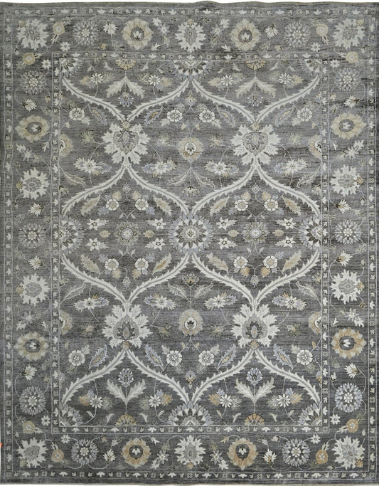 Luxury handknotted 8 x10 woolrug. Gray overall color with accents of ivory, beige, and camel. Soft flowing pattern with a border.