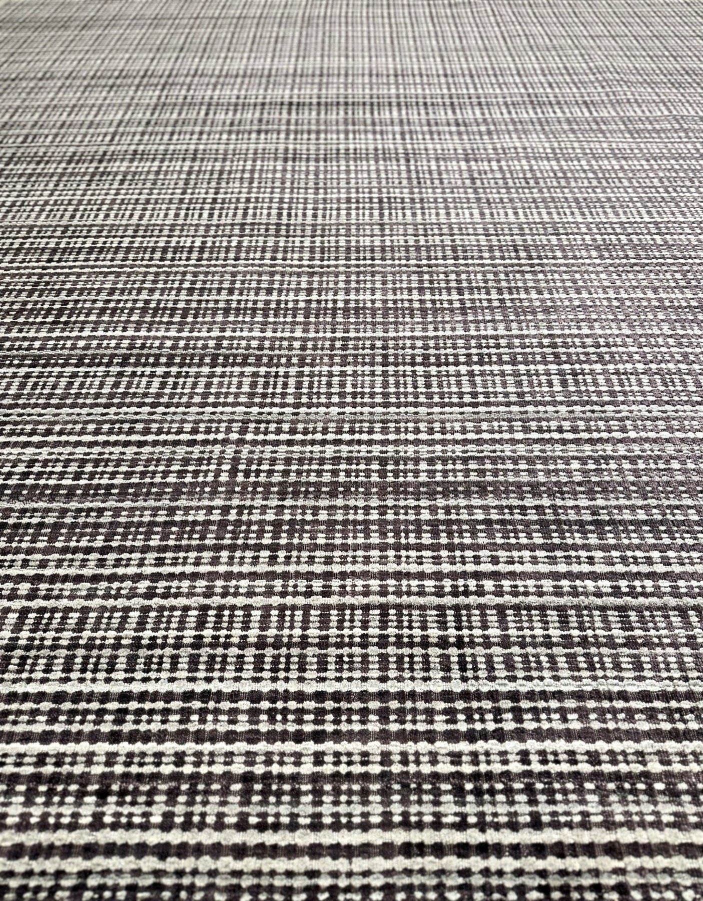 KNOTTED hand knotted woven texture wool rug gray, charcoal, and purple. Modern aesthetic.