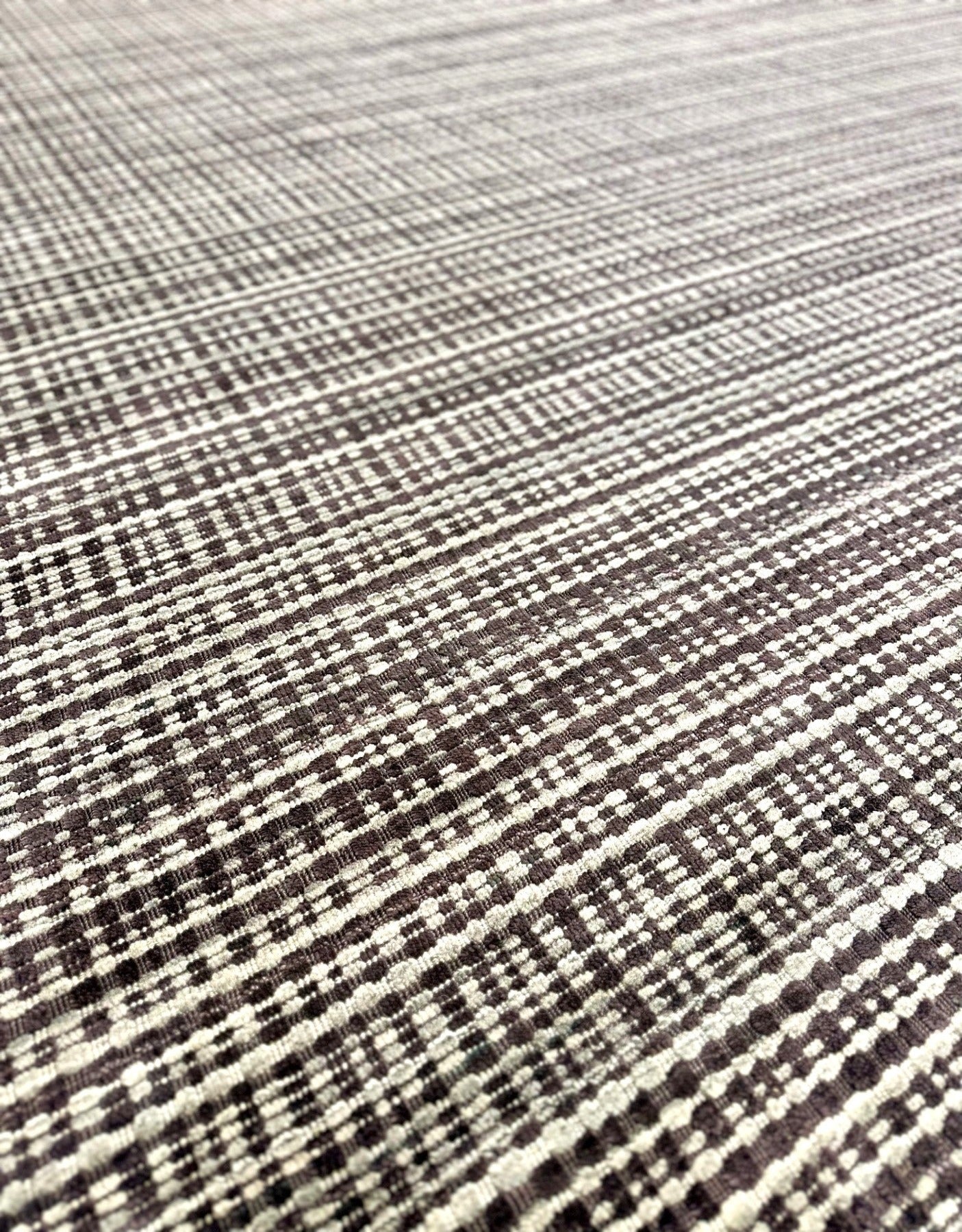 KNOTTED hand knotted woven texture wool rug gray, charcoal, and purple. Modern aesthetic.