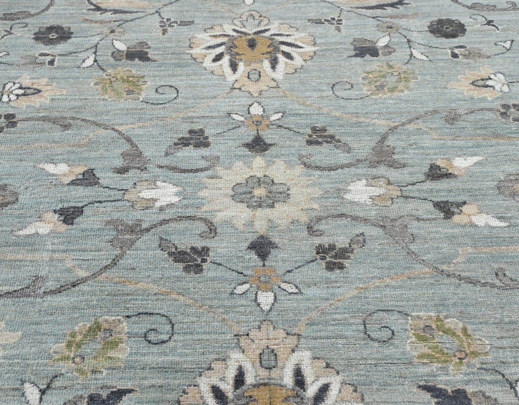 Classic handknotted rug in modern colors