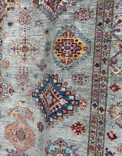 Jewel toned high quality hand-knotted 9x12 rug. Best handknotted rug for cleanability.