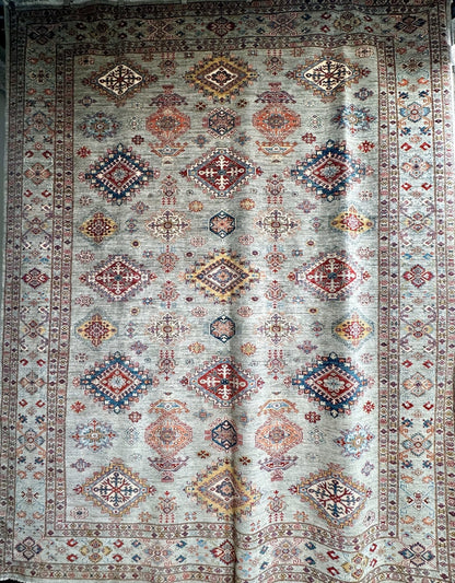 Jewel toned high quality hand-knotted 9x12 rug. Best handknotted rug for cleanability.