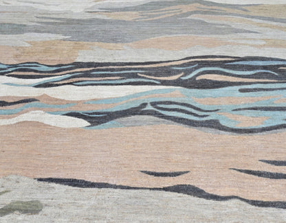 High end, designer modern all wool rug in soft layered colors.