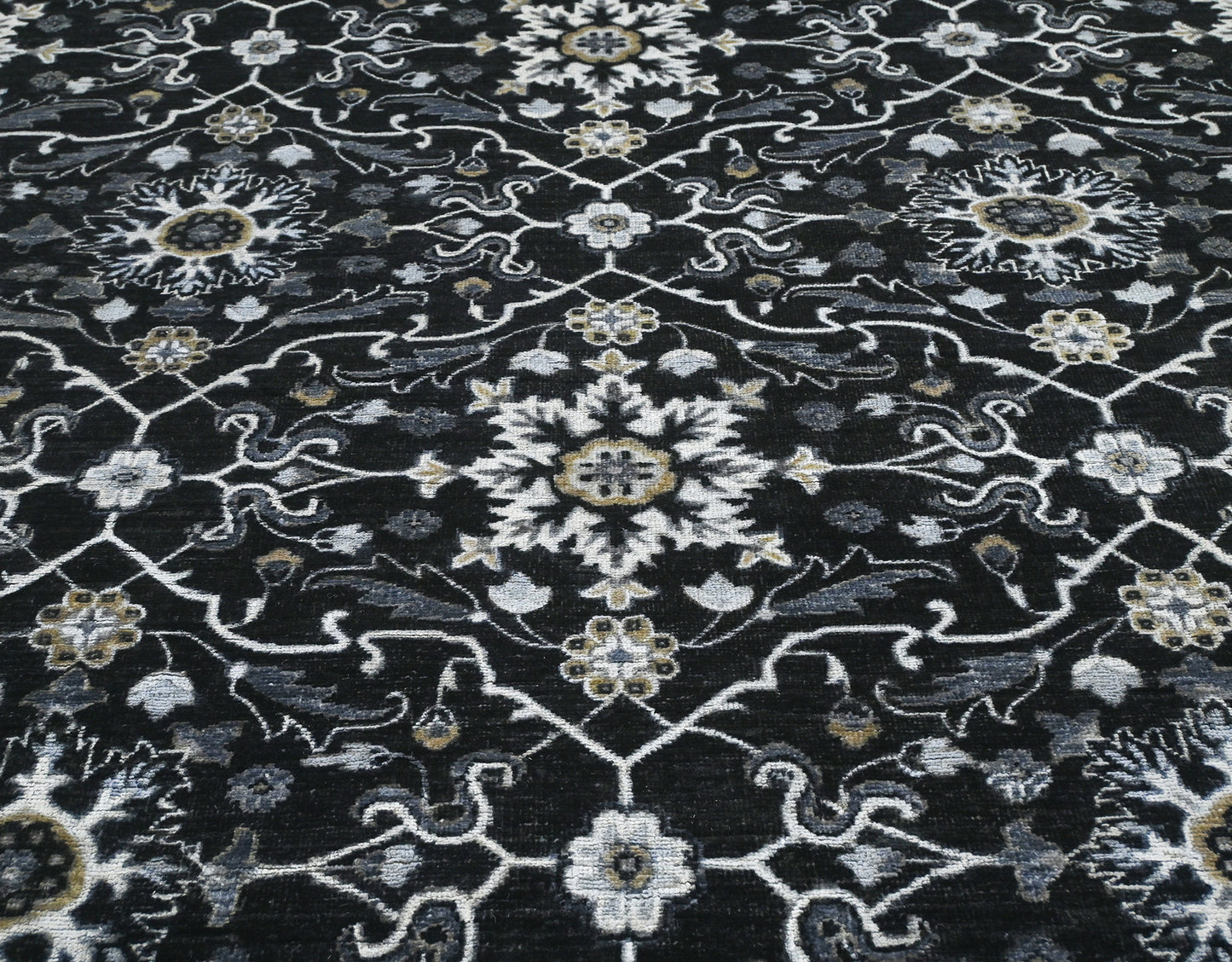 Luxury hand-knotted wool rug. Black with no border and available for custom order.