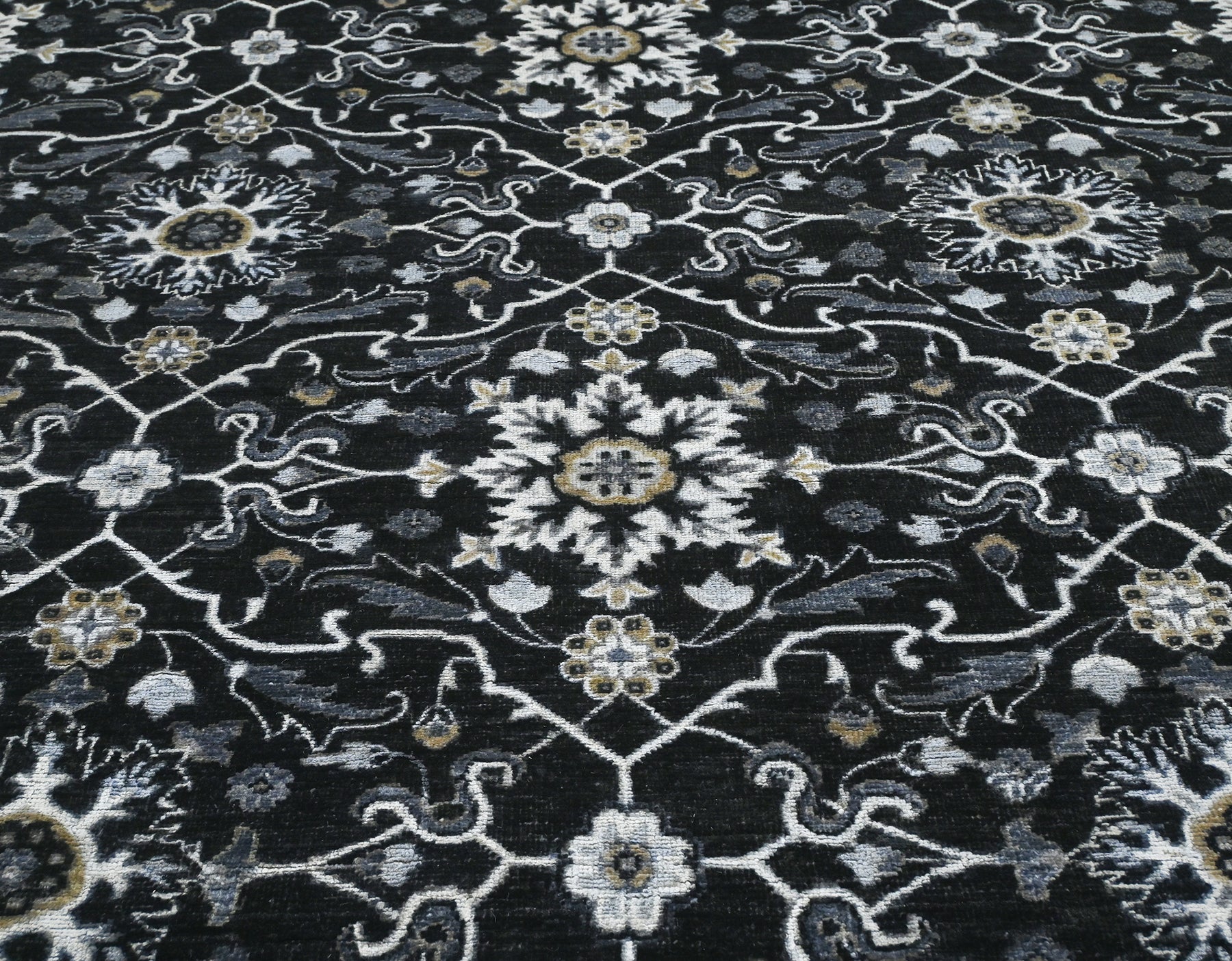 Luxury hand-knotted wool rug. Black with no border and available for custom order.