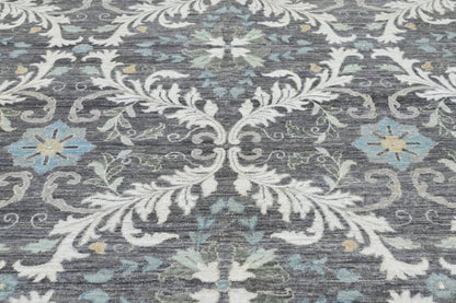 Knotted rug handknotted wool classic look. Quiet luxury in shades of gray, charcoal, blue, taupe, and ivory.