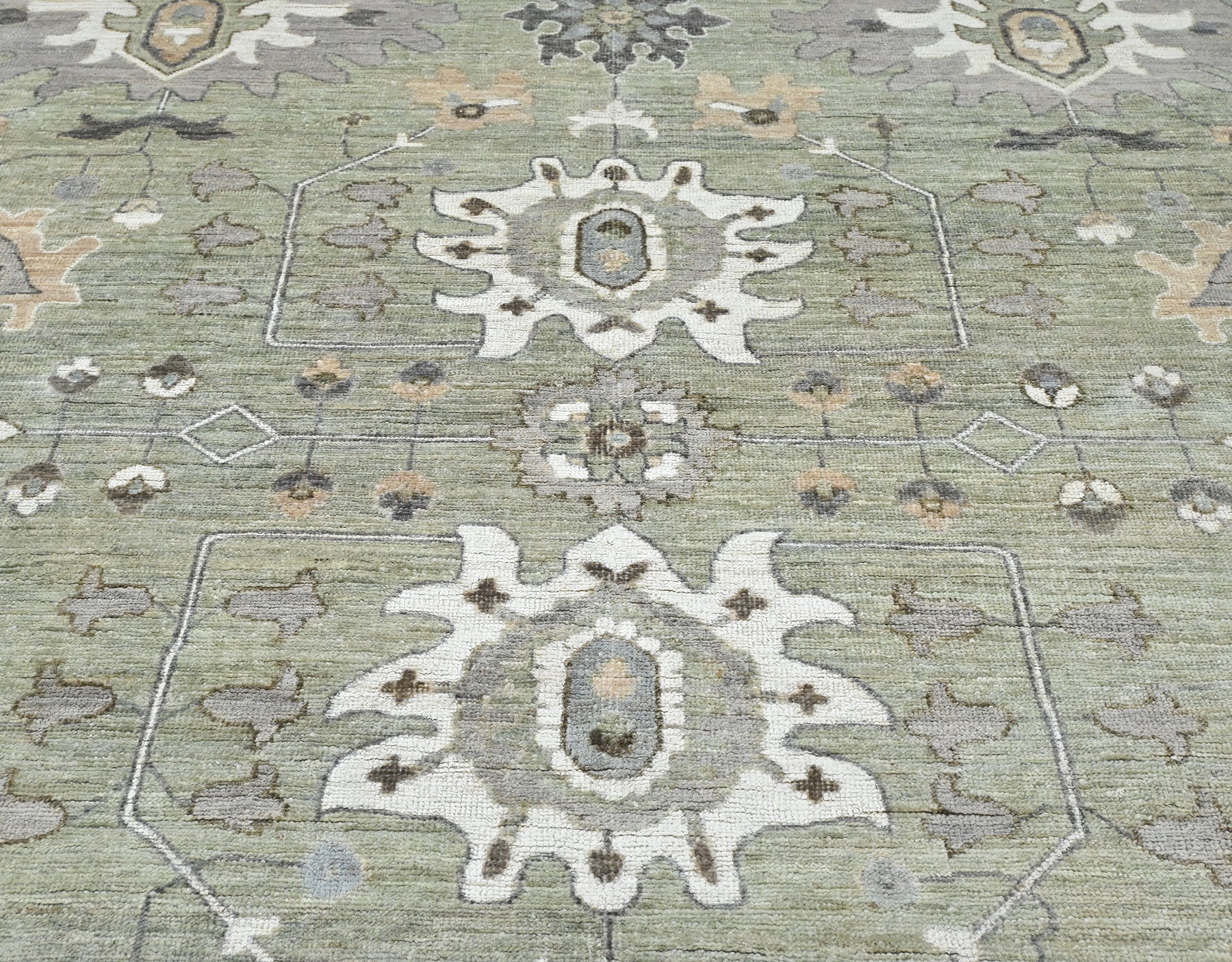 Couture 750 Granite Organic Wool 9x12 carpet in a soft green
