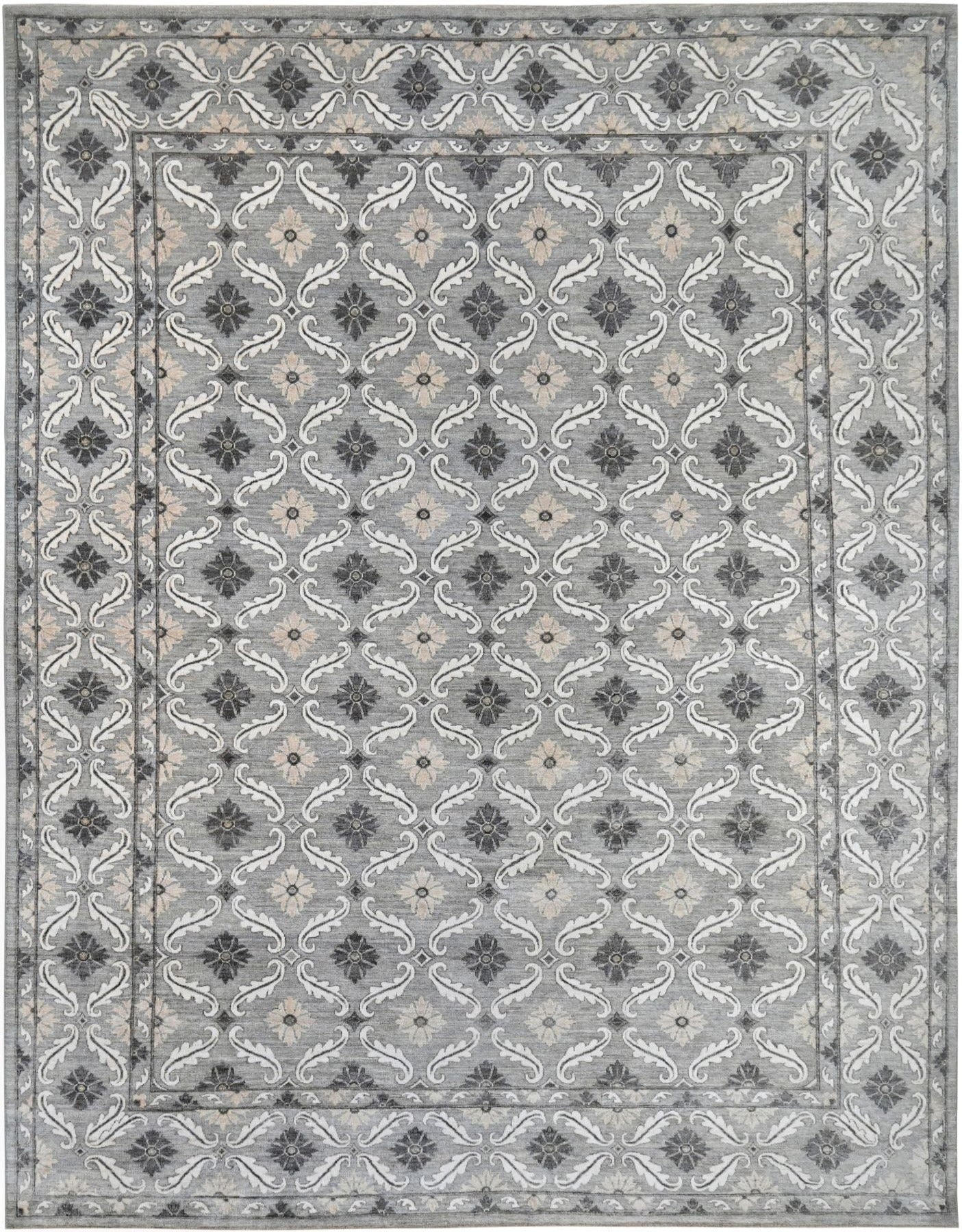 Designer exclusive handknotted rug with repetitive pattern in neutral colors. Size 9 x 12 rug.