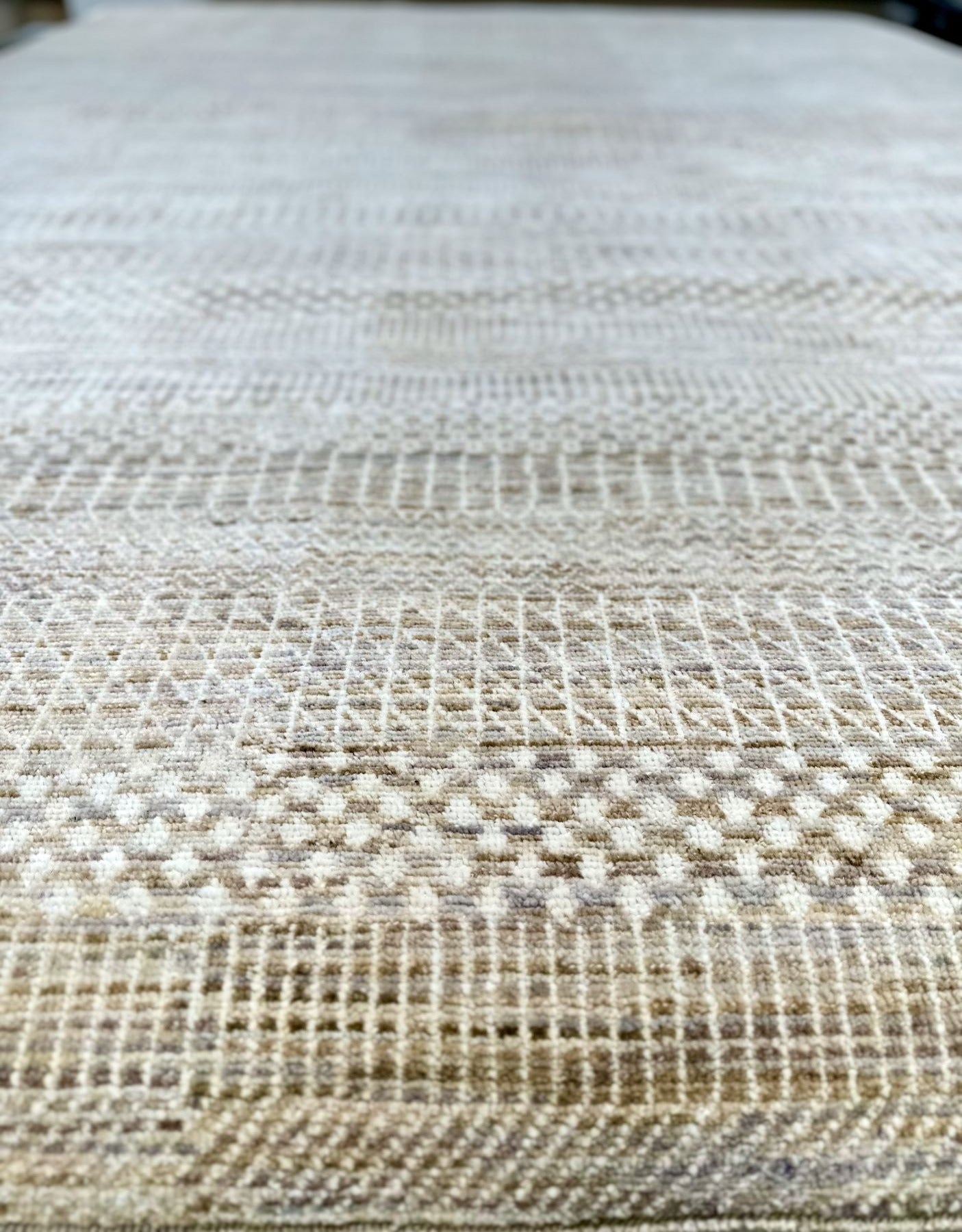 Modern textural handknotted rug with shades of gray, brown, blue, and cream