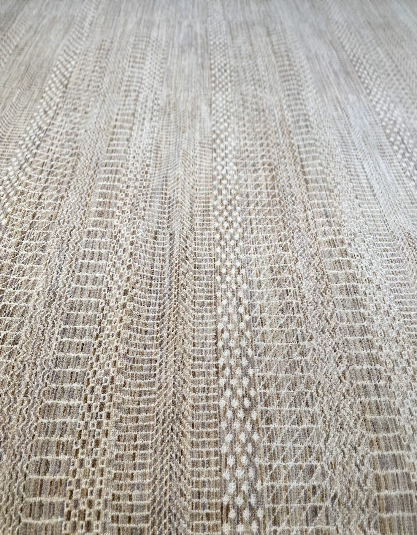 Modern textural handknotted rug with shades of gray, brown, blue, and cream