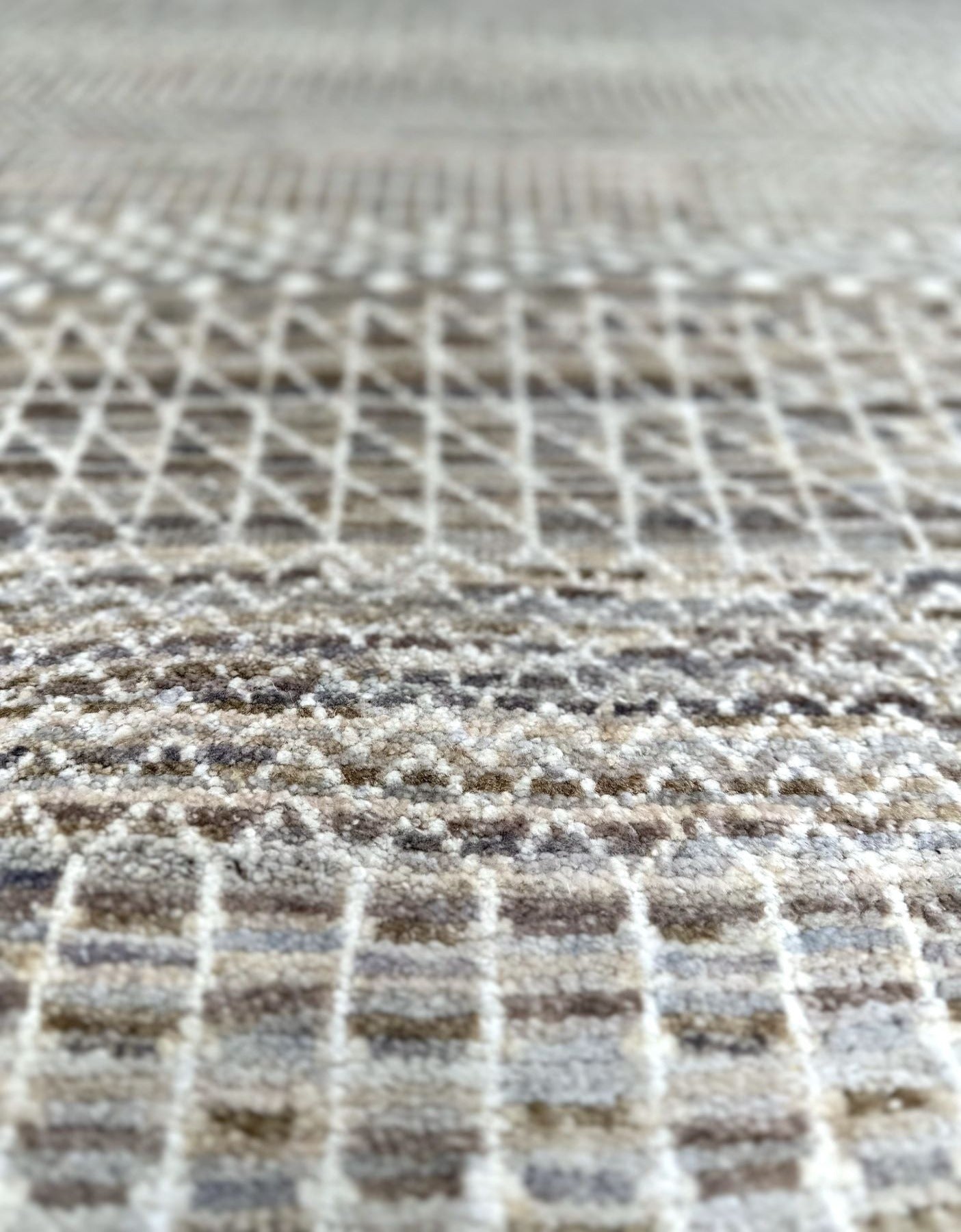Modern textural handknotted rug with shades of gray, brown, blue, and cream