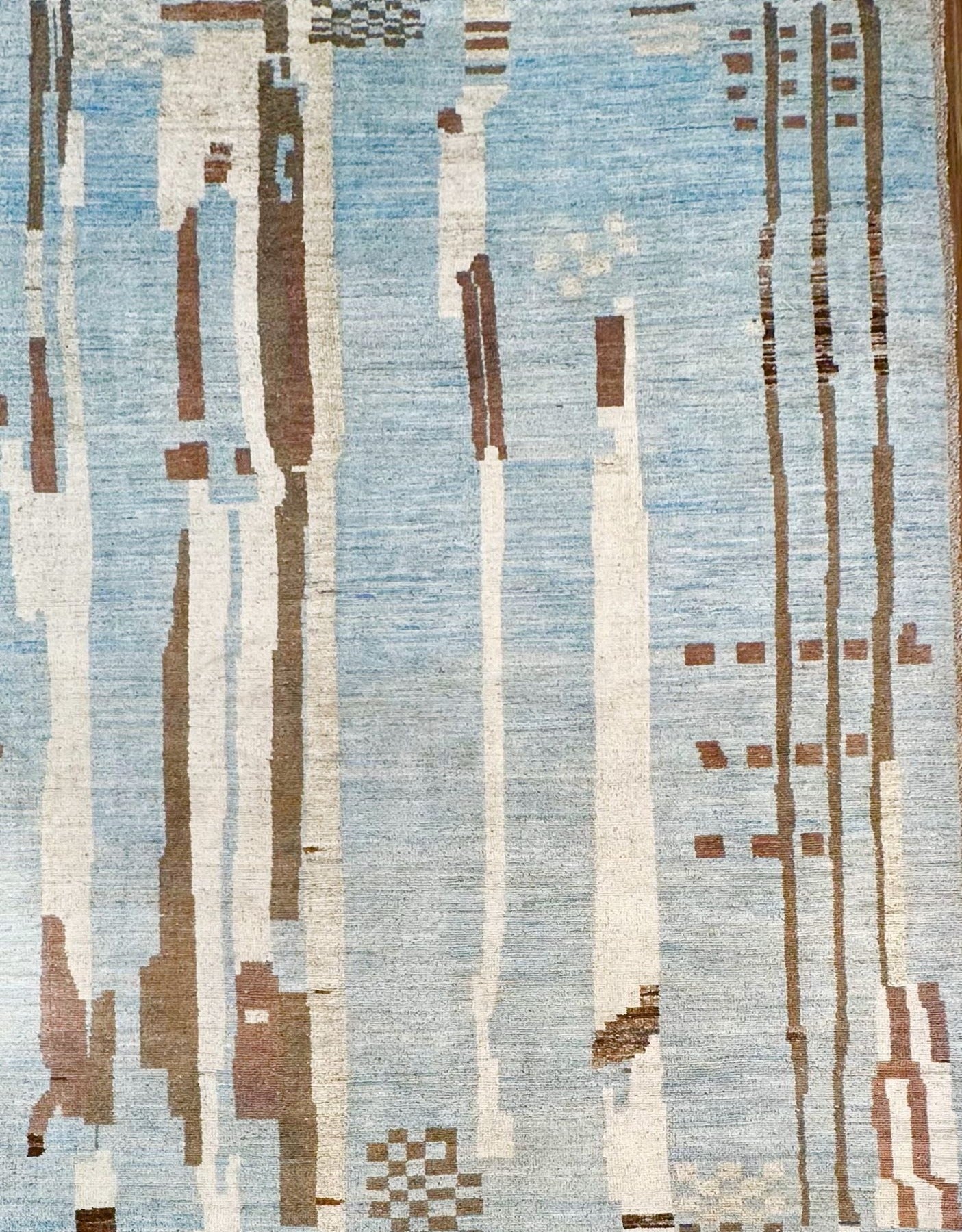 Modern moroccan 100% wool hand-knotted rug. Shades of blue, cream, and tobacco brown. Large luxury rug, exact size 10'4" x 13'10". Product of Pakistan.