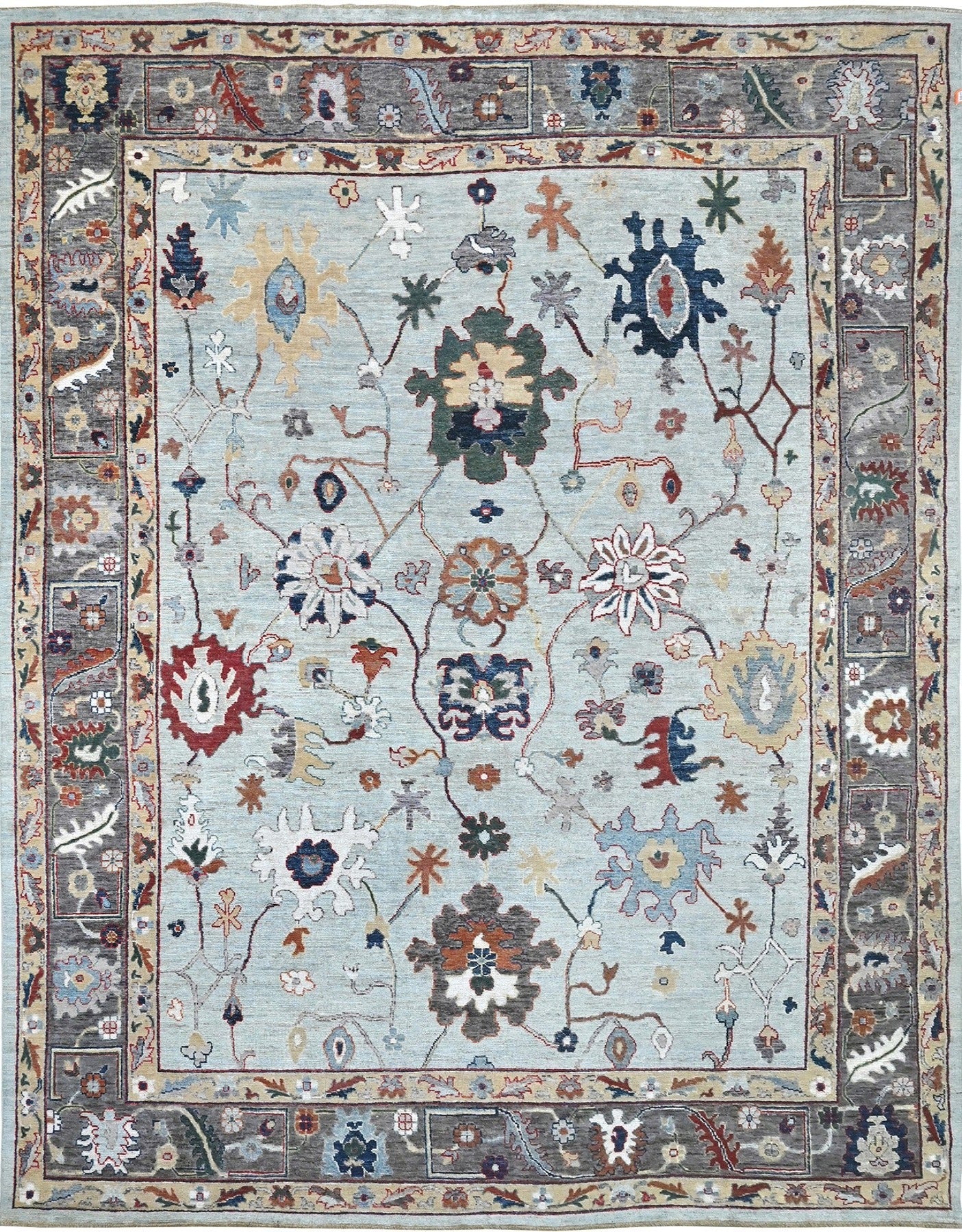 Nantucket Oushak rug with silver blue and denim