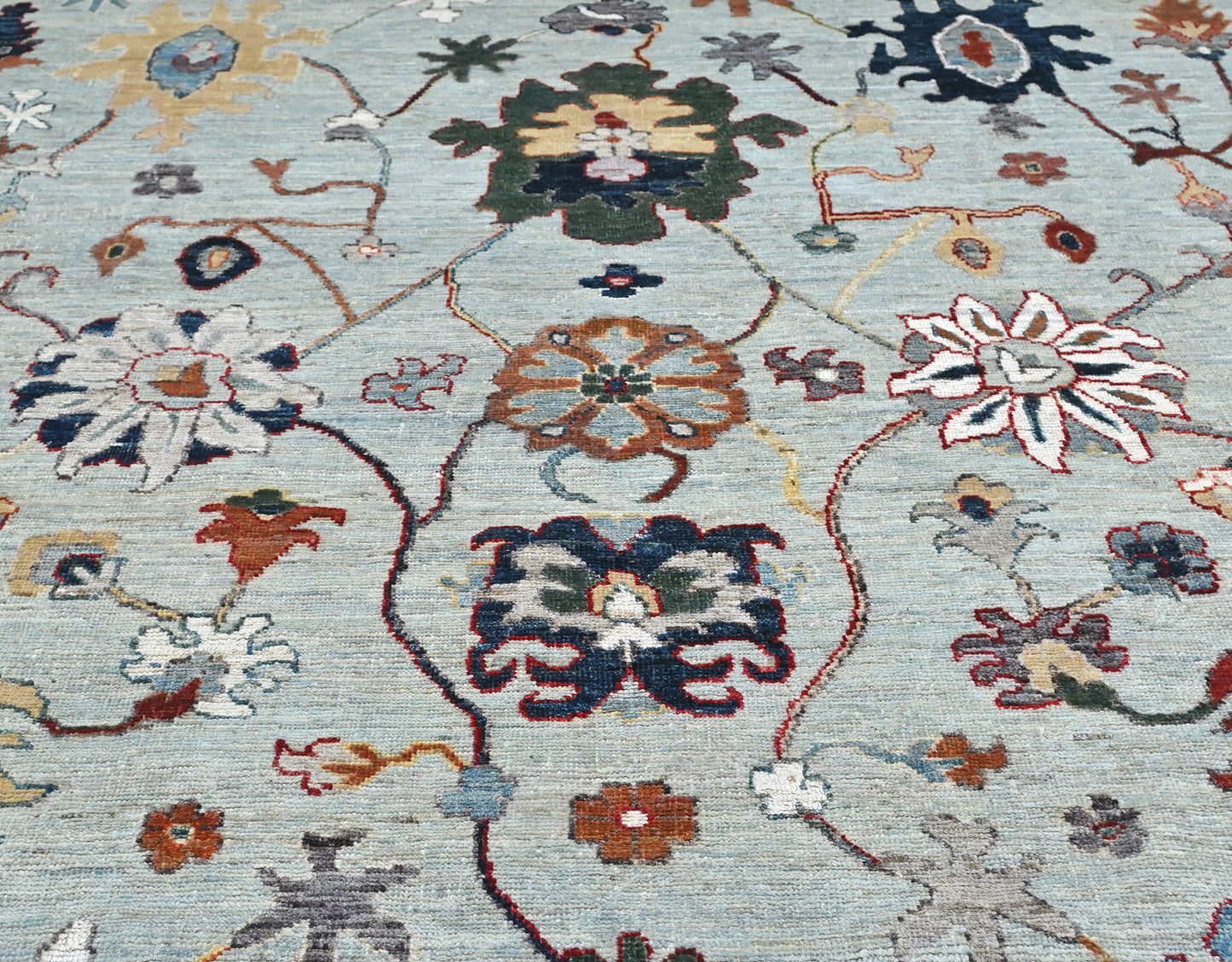 Nantucket Oushak rug with silver blue and denim