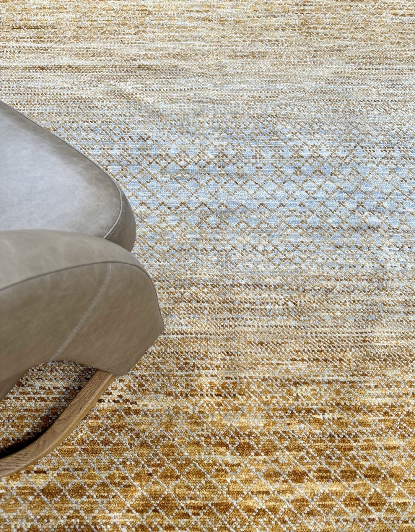 Luxury wool handknotted rug in textural pattern with golden and gray tones