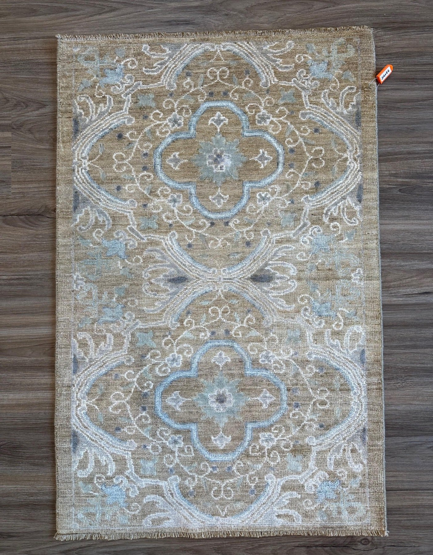 Knotted Couture luxury hand knotted wool rug geometric tan and blue 